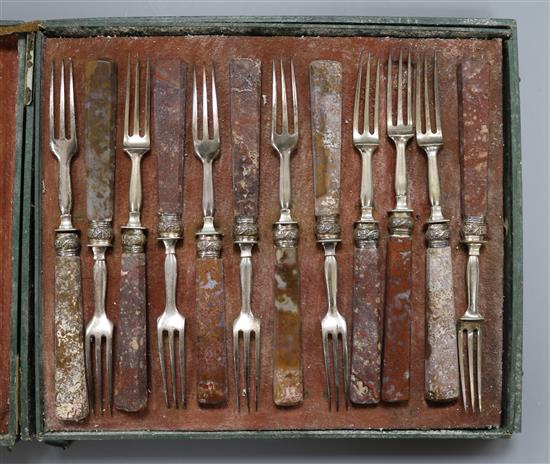 A 19th century cased set of twelve pairs of jasper handled plated dessert eaters